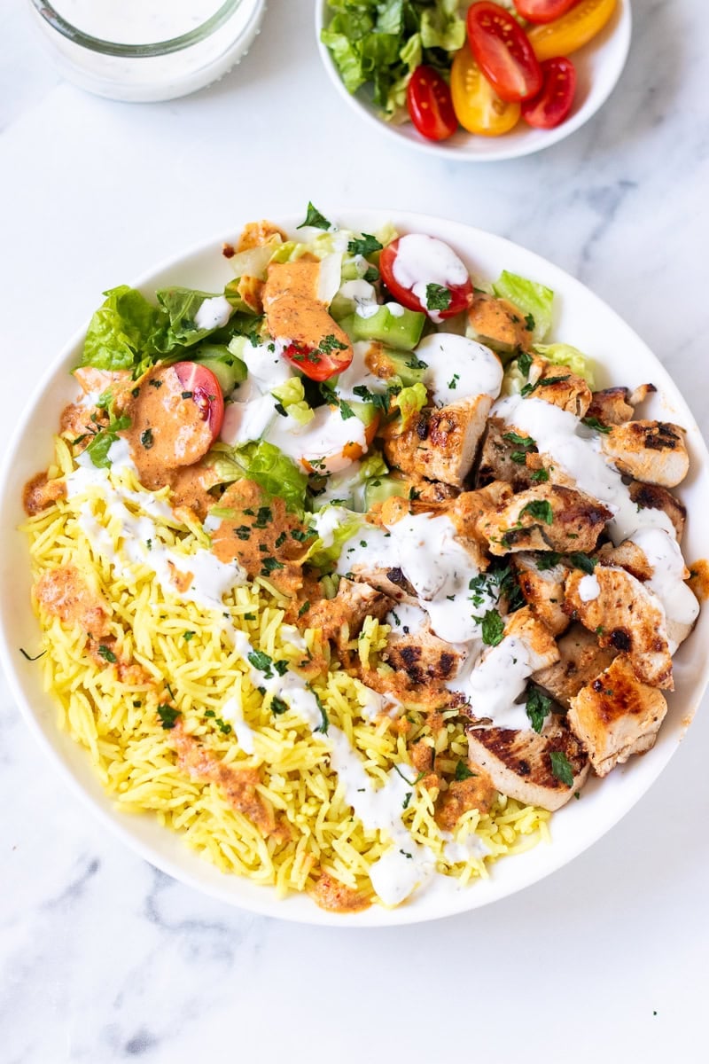 top down view of a plate of halal guys chicken and rice 