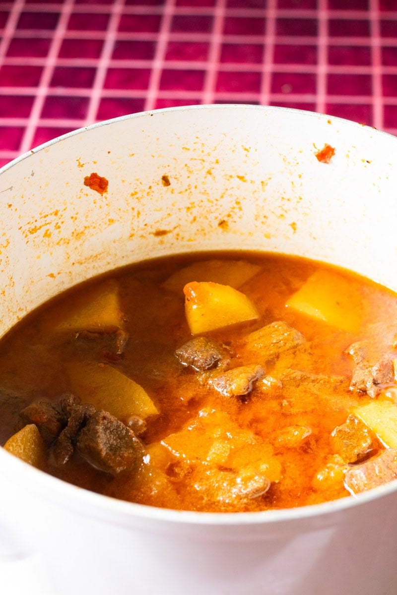 potatoes and meat curry in a pot.
