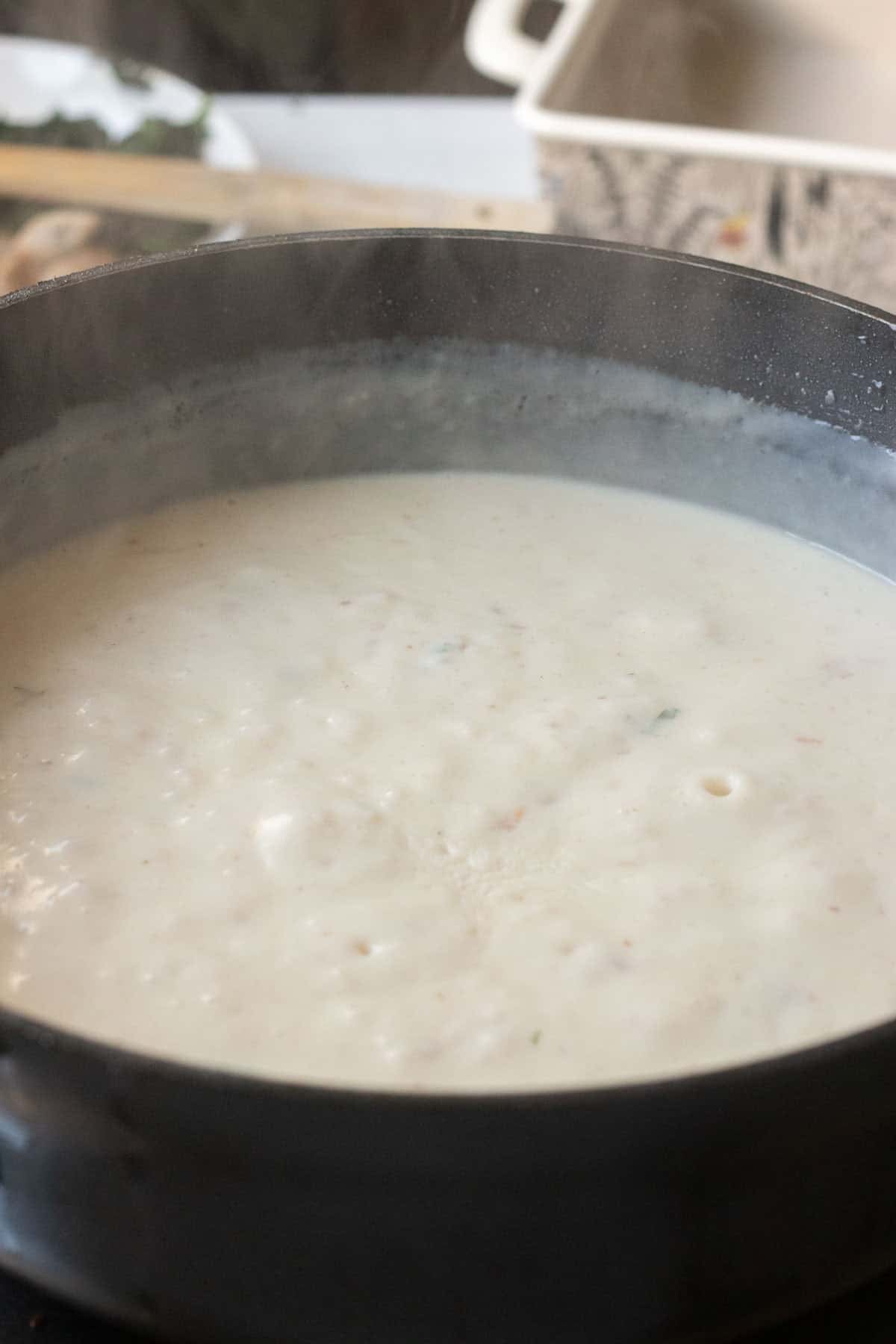 milk added to make the white sauce base