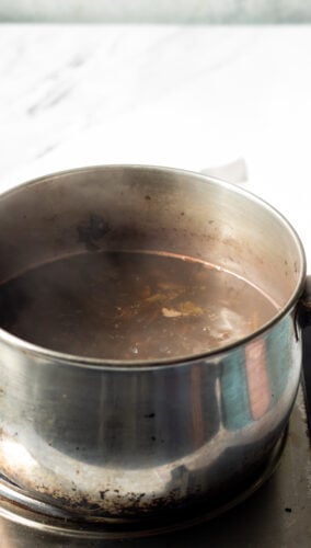 Kahwa as it reduces - kashmiri chai in a pot