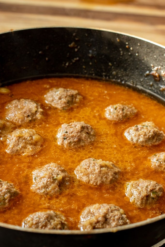 koftay simmering in curry