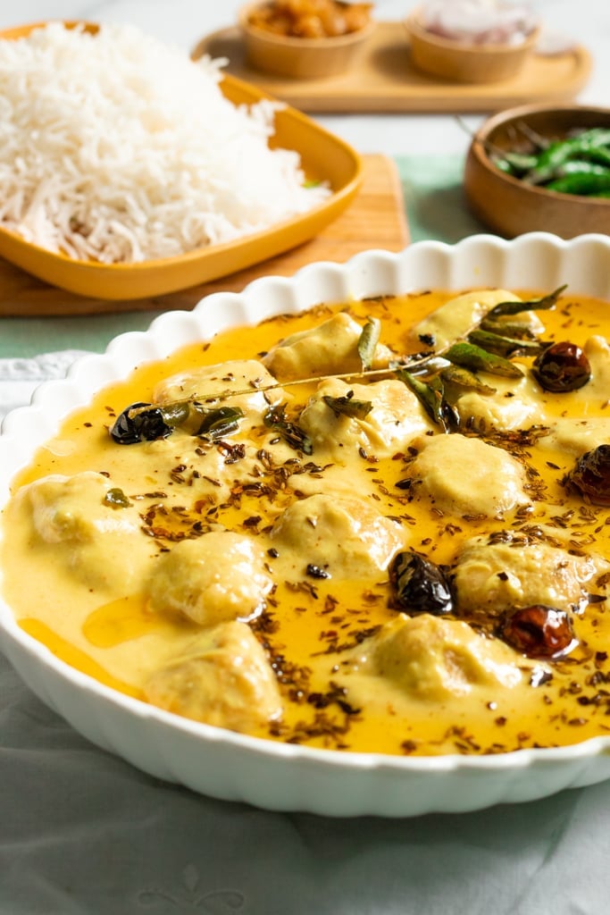 Kadhi Pakora in a dish, rice in the background