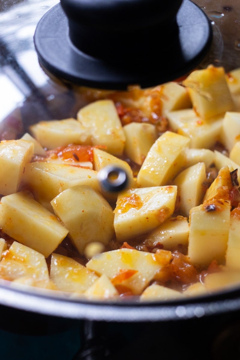 potatoes cooking for aloo baingan 
