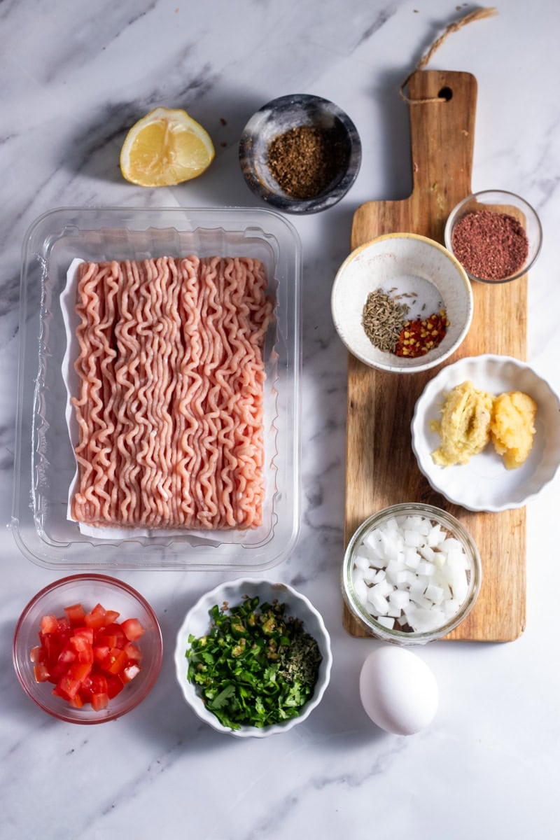 top down view of chapli kabab ingredients 