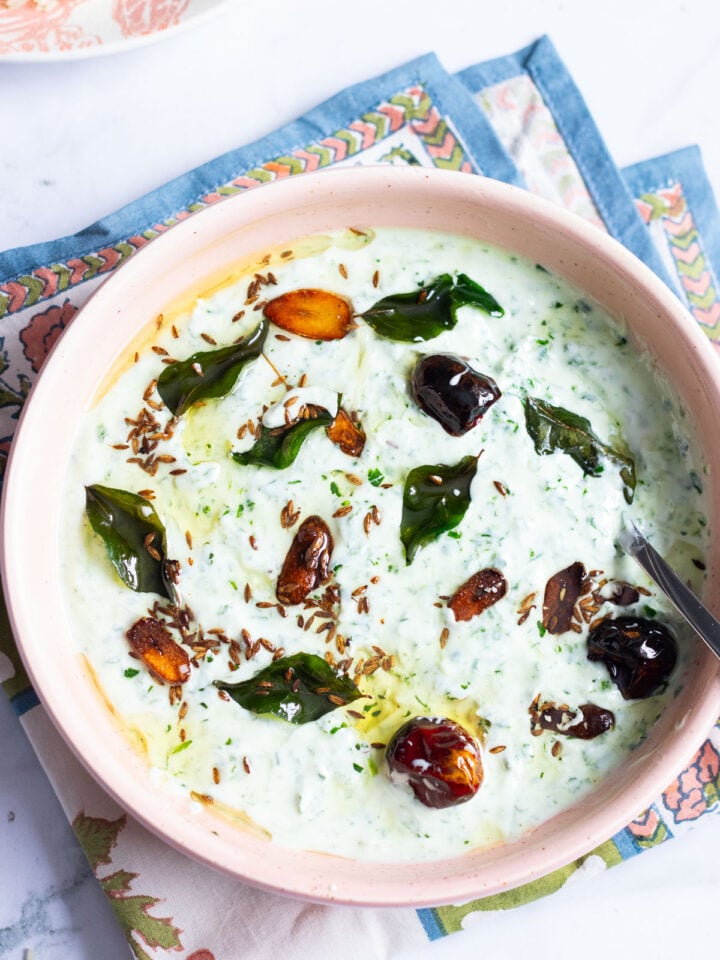 top down view of a bowl of spinach raita