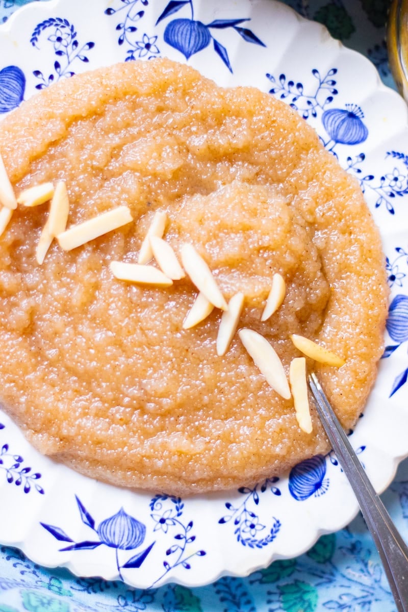 top down view of sooji ka halwa on a plate